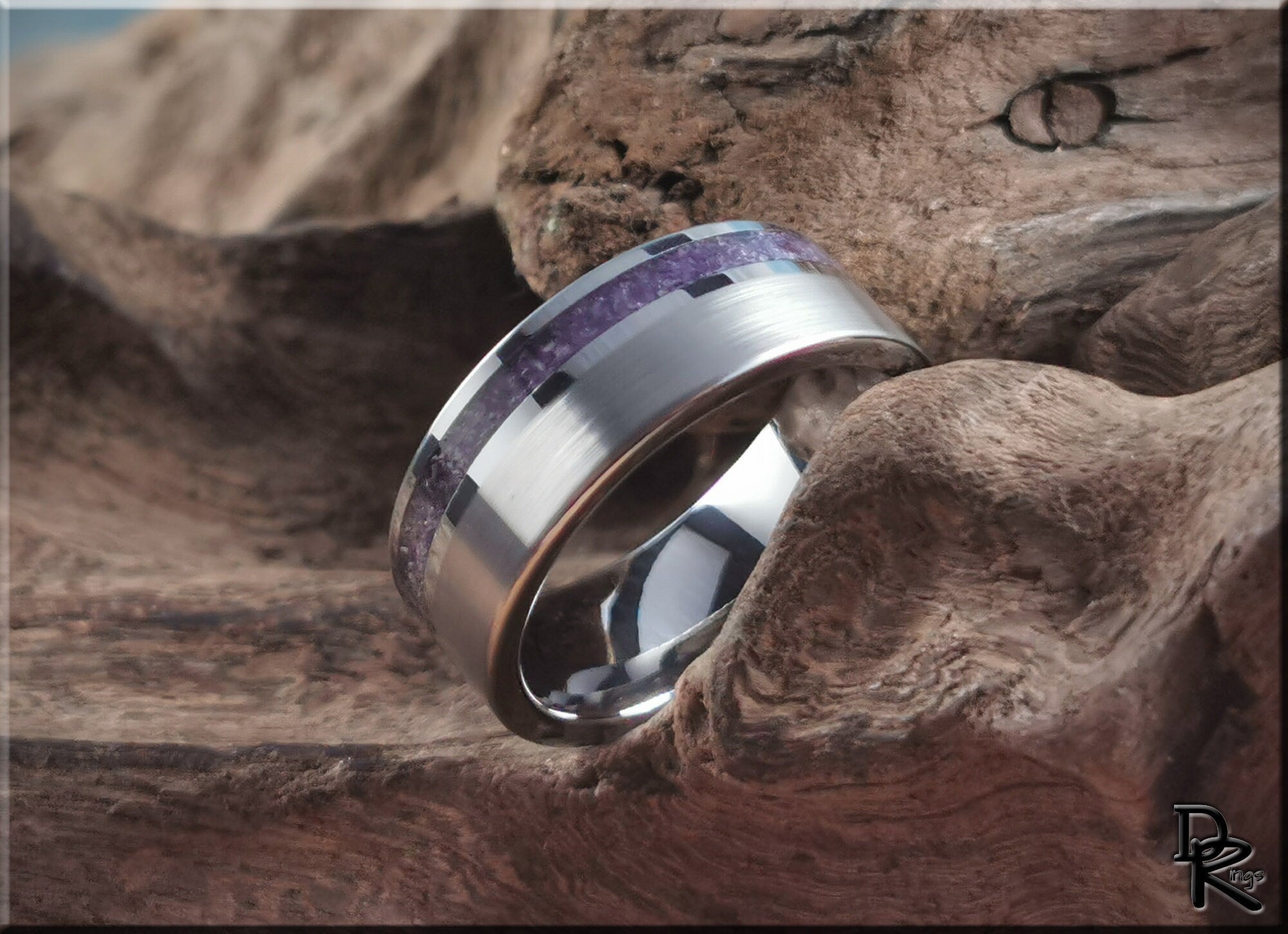 DR Rings tungsten ring with amethyst inlay on rustic wooden surface