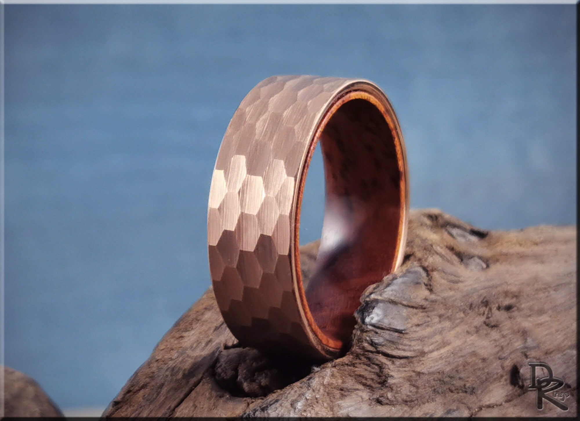 Tungsten ring with wood liner featuring hammered texture on the outer surface by DR Rings