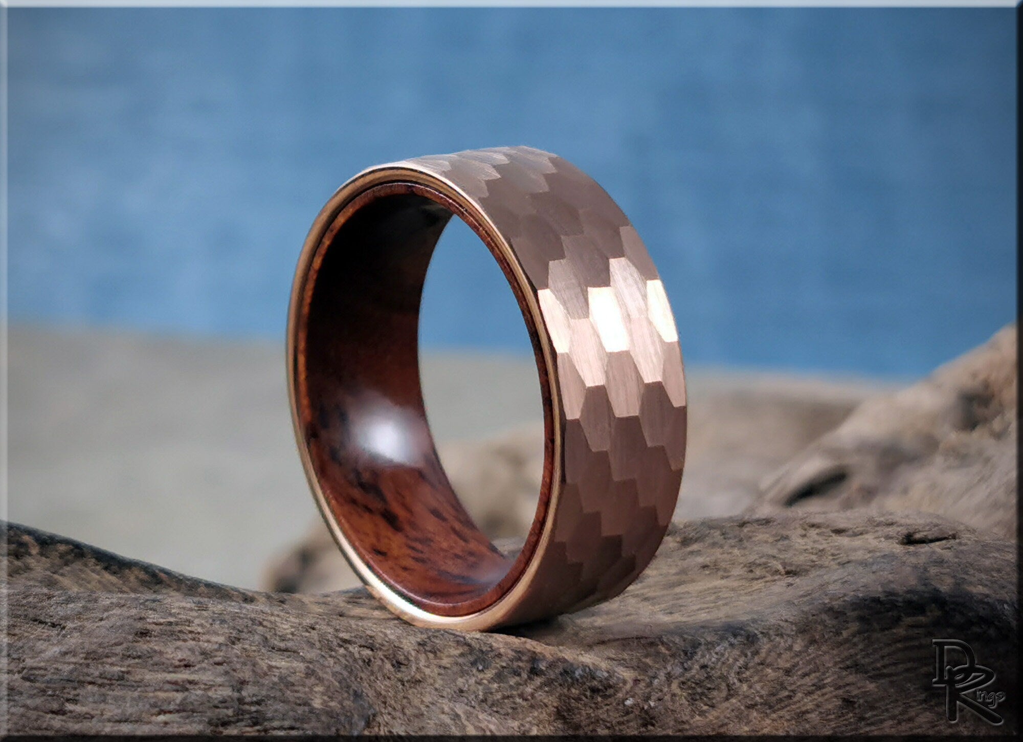 DR Rings tungsten ring with wood liner featuring a hammered copper exterior and polished wood interior
