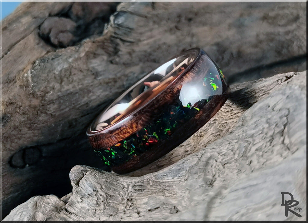 DR Rings wood ring with opal inlay featuring a dark wooden band and vibrant multicolor opal accents