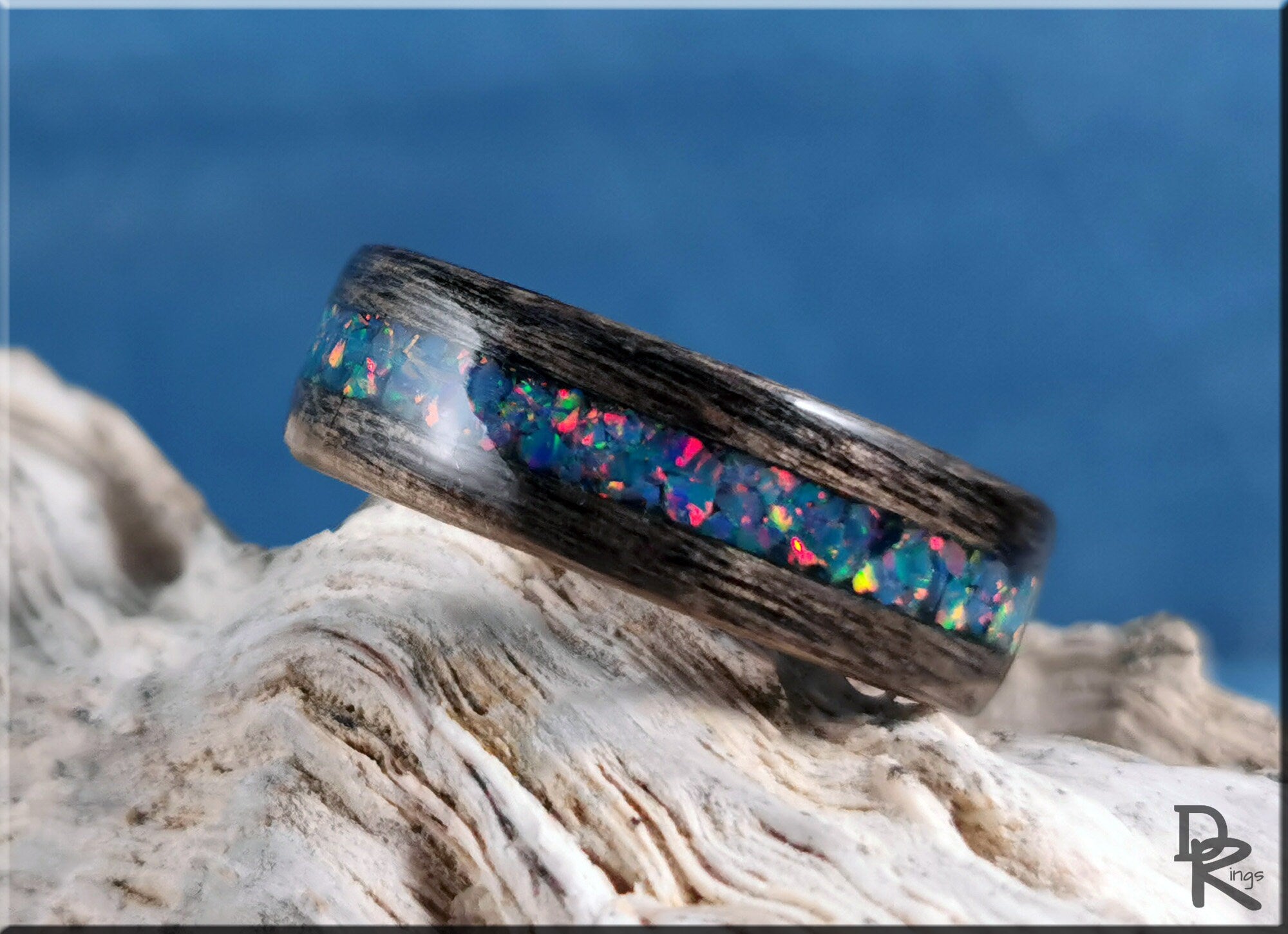 DR Rings wood ring with opal inlay featuring colorful opal stones set in dark wood band
