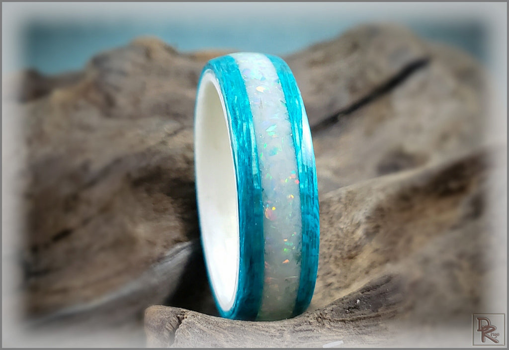 DR Rings wood ring with opal inlay featuring turquoise blue wood and shimmering opal center