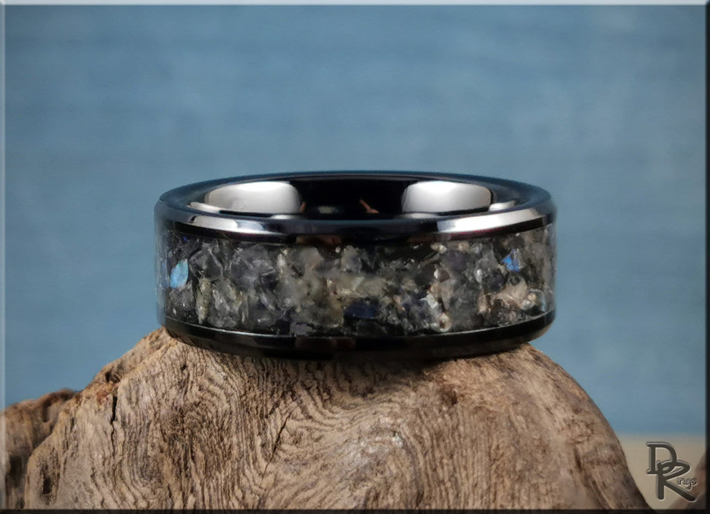 Black ceramic ring with inlay featuring a polished finish and textured stone design by DR Rings