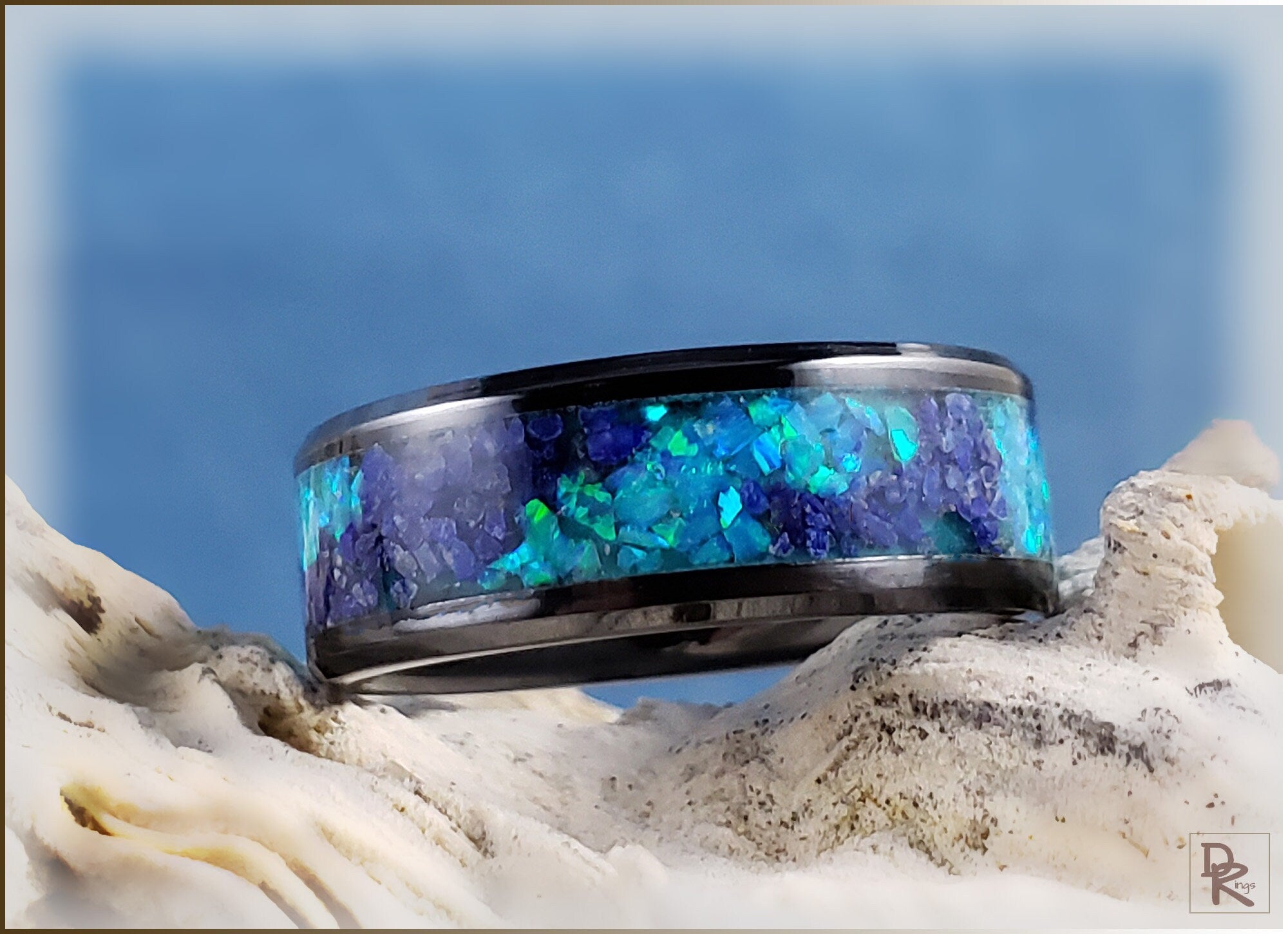 Ceramic ring with glow inlay featuring blue and green luminescent stones by DR Rings