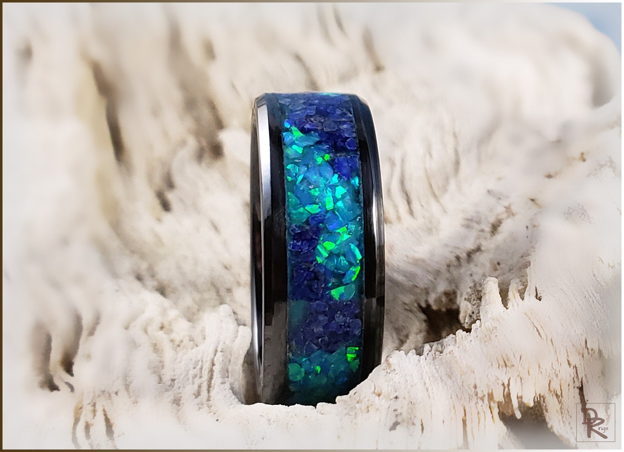 DR Rings ceramic ring with glow inlay featuring vibrant blue and green inlay on black band