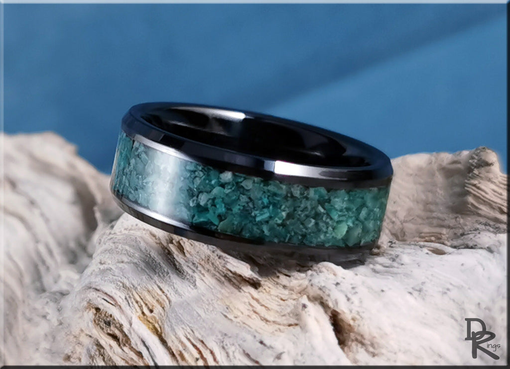 DR Rings black ceramic ring with inlay featuring turquoise stone detail on textured surface