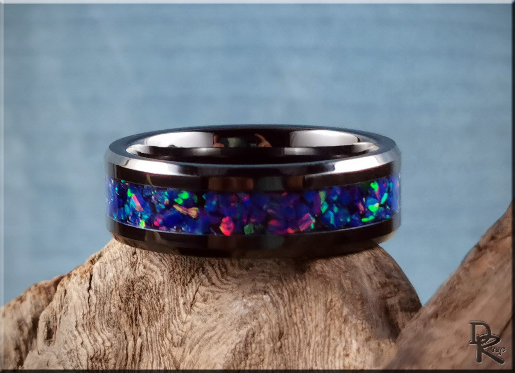 DR Rings ceramic ring with opal inlay featuring vibrant blue and green iridescent colors
