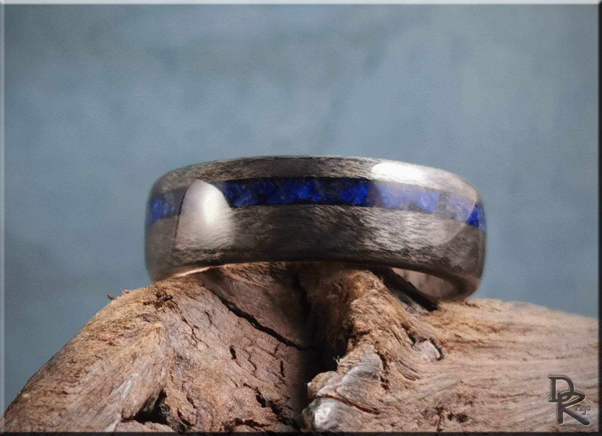 DR Rings mens band ring with lazuli lapis inlay on rustic wood background