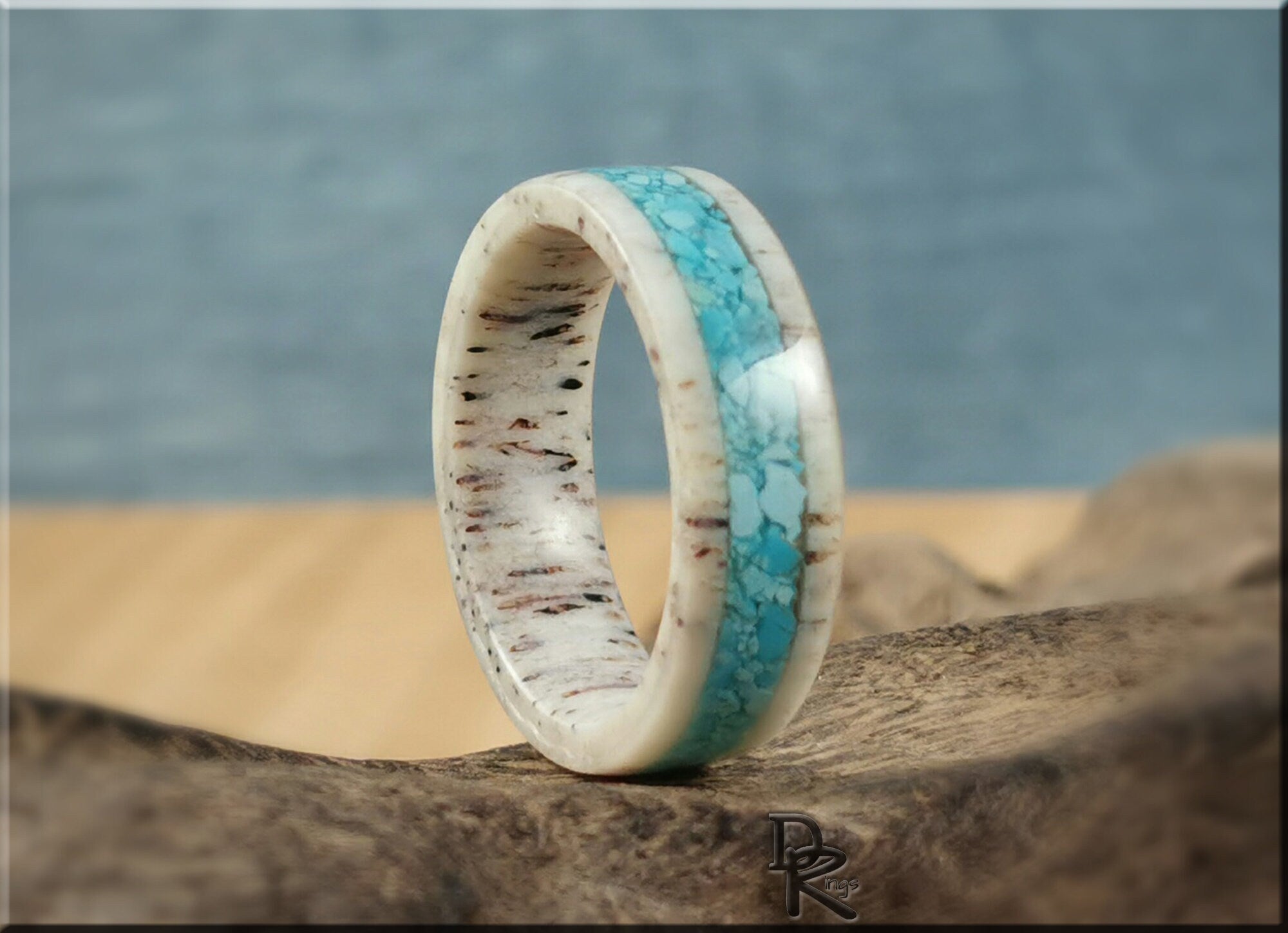 Deer antler ring with turquoise inlay by DR Rings showcasing natural texture and vibrant blue stone