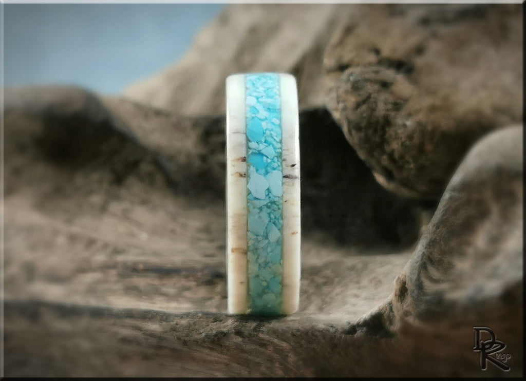 Deer antler ring with turquoise inlay by DR Rings showcasing natural textures and vibrant blue stone