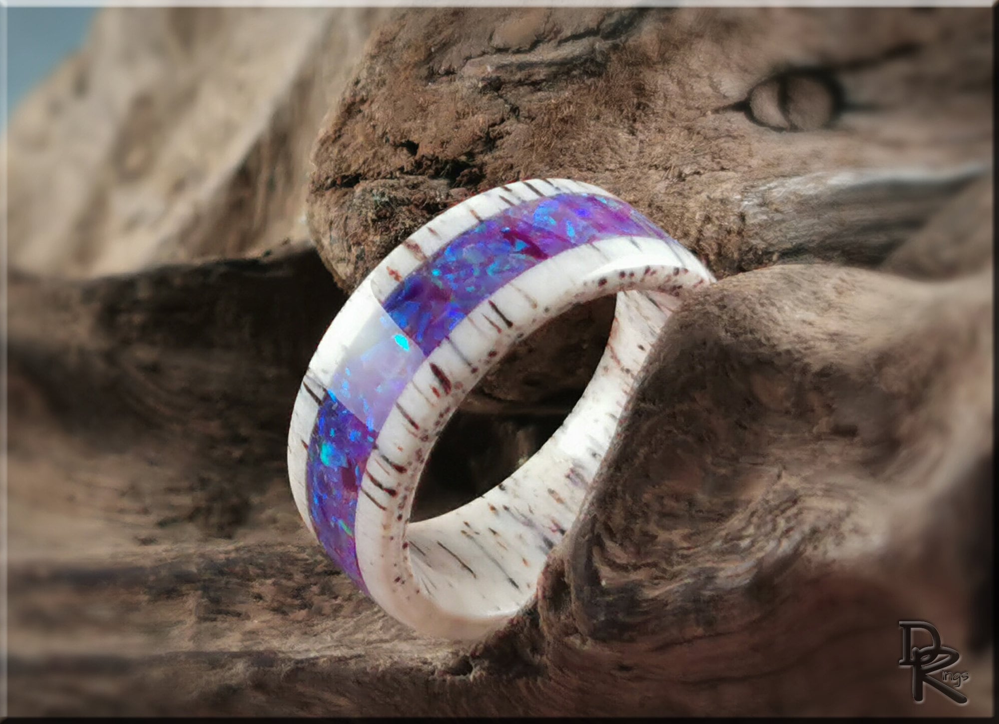 Deer antler ring with opal inlay by DR Rings featuring vibrant blue opal and natural antler texture