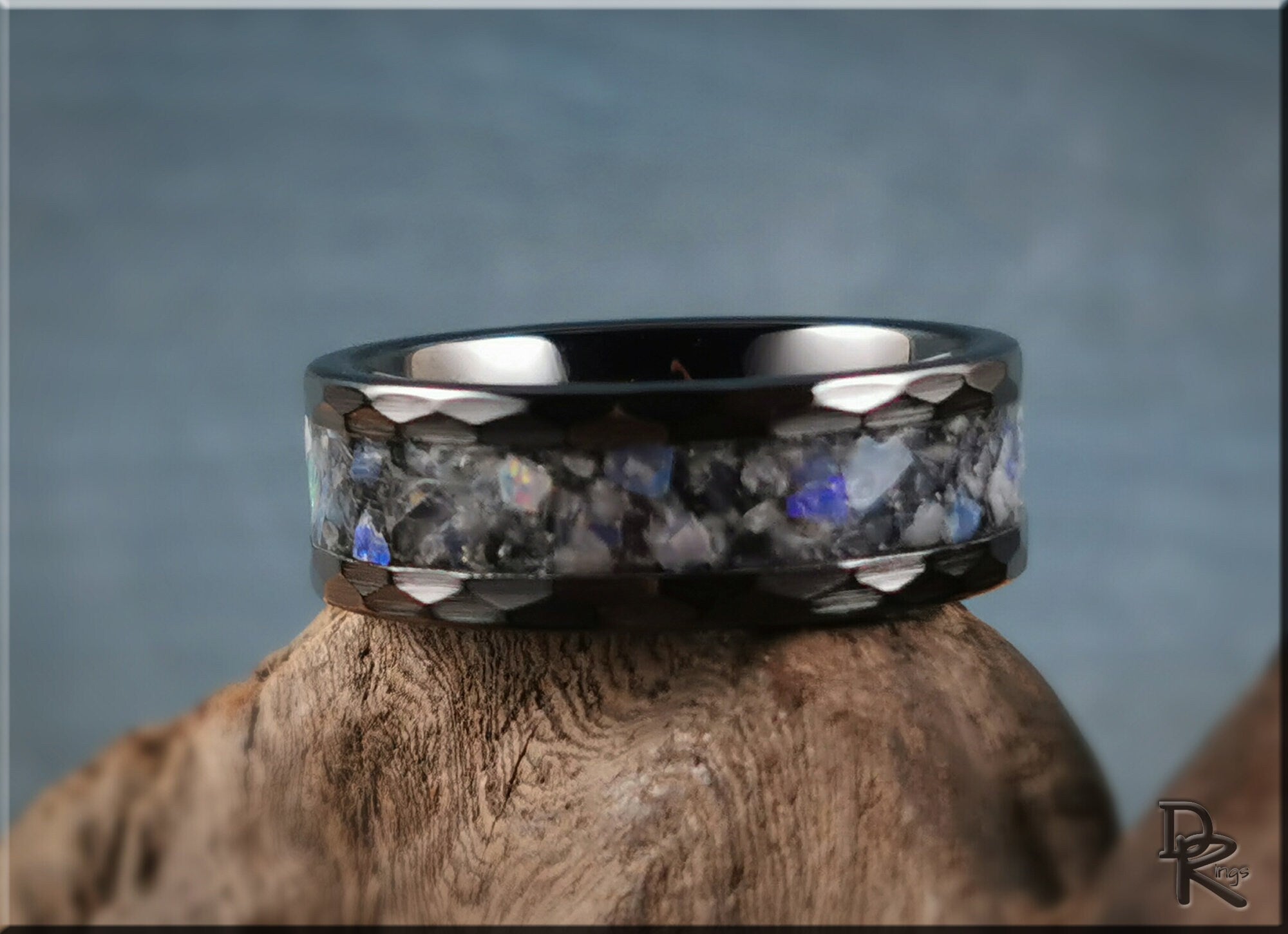 Hammered ceramic ring with inlay featuring black and iridescent stone design by DR Rings