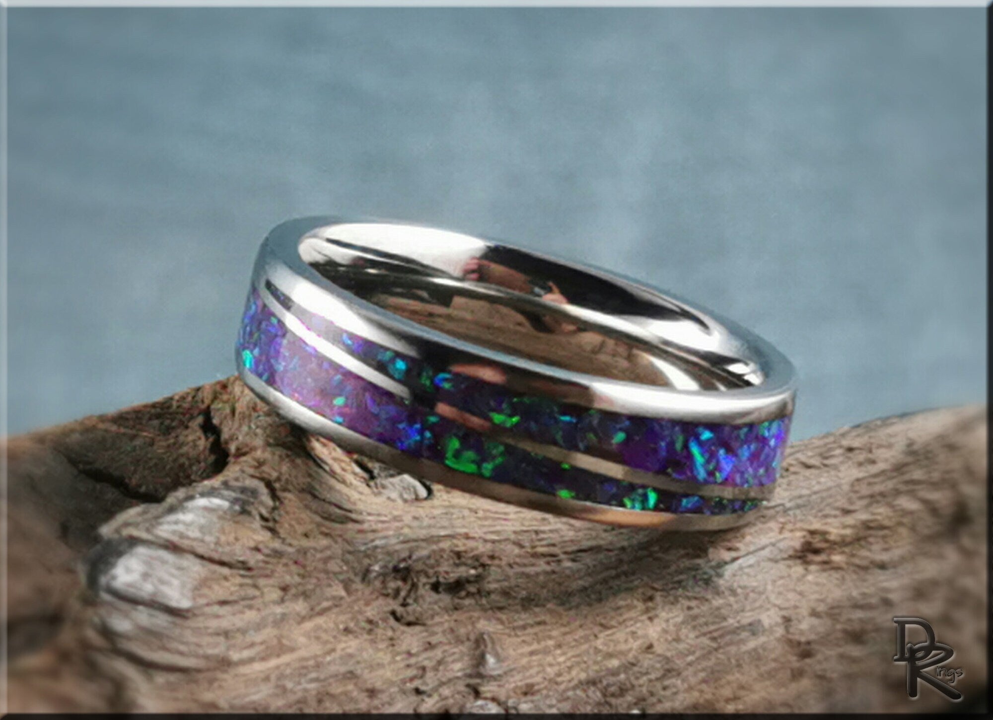 DR Rings titanium ring with opal featuring vibrant blue and green opal inlay on silver band
