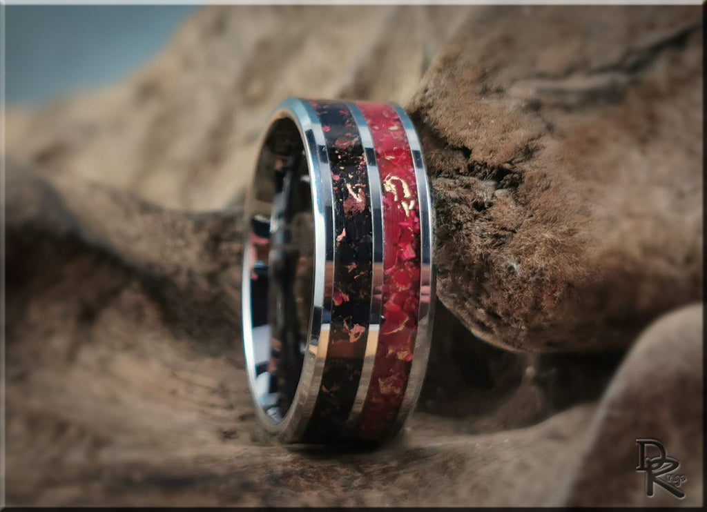 DR Rings tungsten carbide ring with inlay featuring red and black textured bands on a rustic background