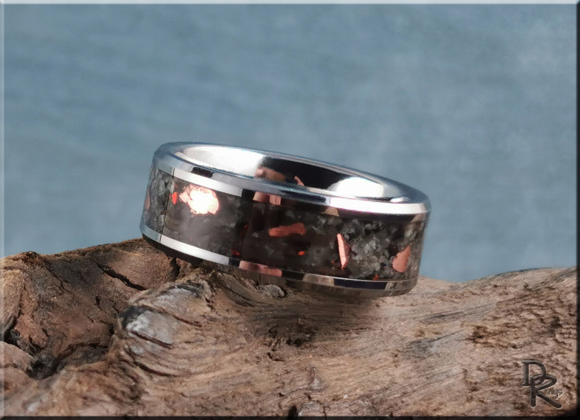 DR Rings tungsten ring carbide with yooperlite featuring a polished metal band with copper and black stone inlay