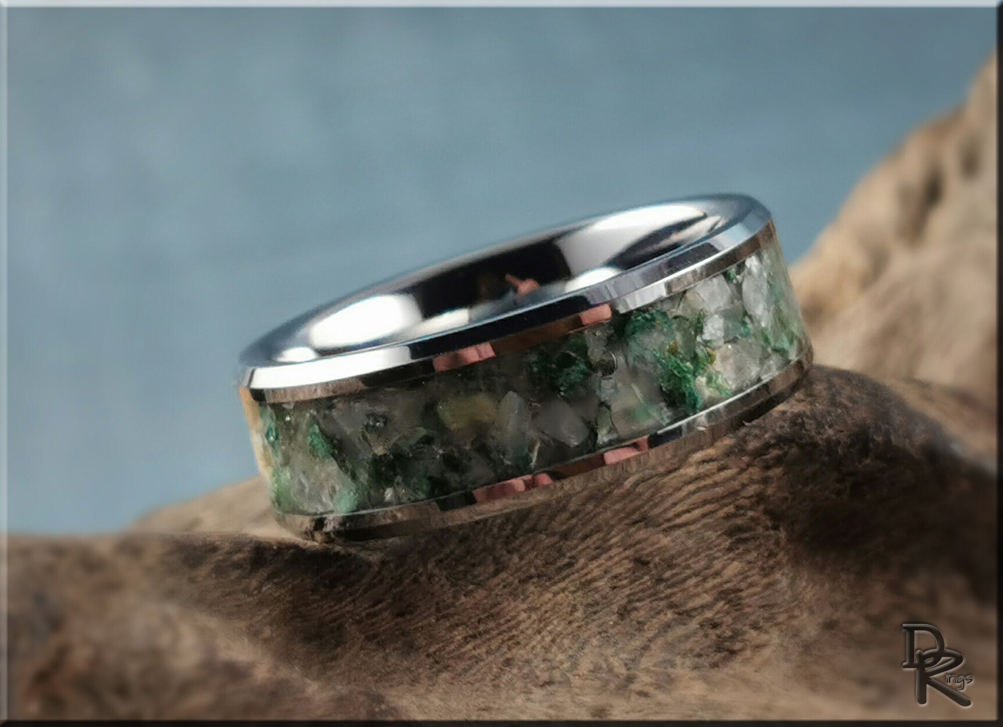 DR Rings tungsten ring with moonstone featuring green and white inlay on a shiny silver band