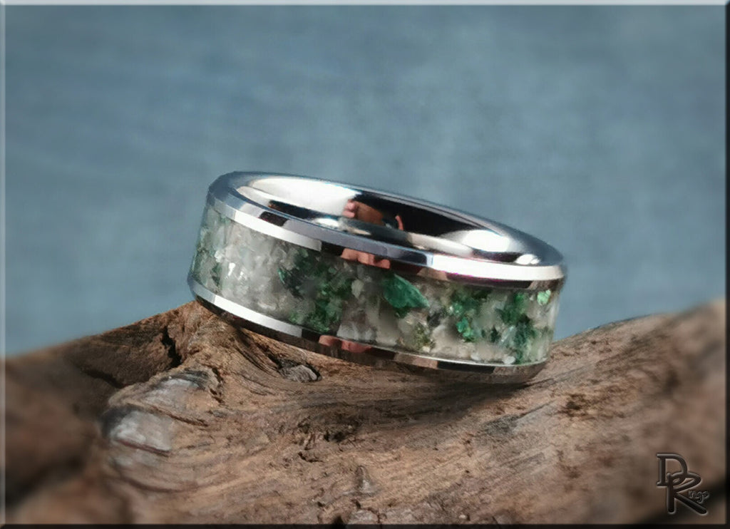 DR Rings tungsten ring with moonstone inlay featuring green and white stones on rustic wood