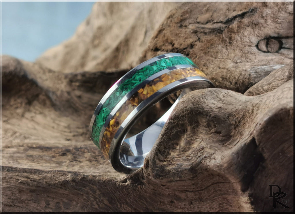 DR Rings metal band featuring green and yellow eye tigers inlay on rustic wooden background