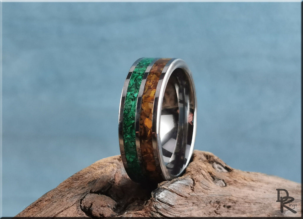 DR Rings eye tigers men's band ring with green and orange inlays on wood background