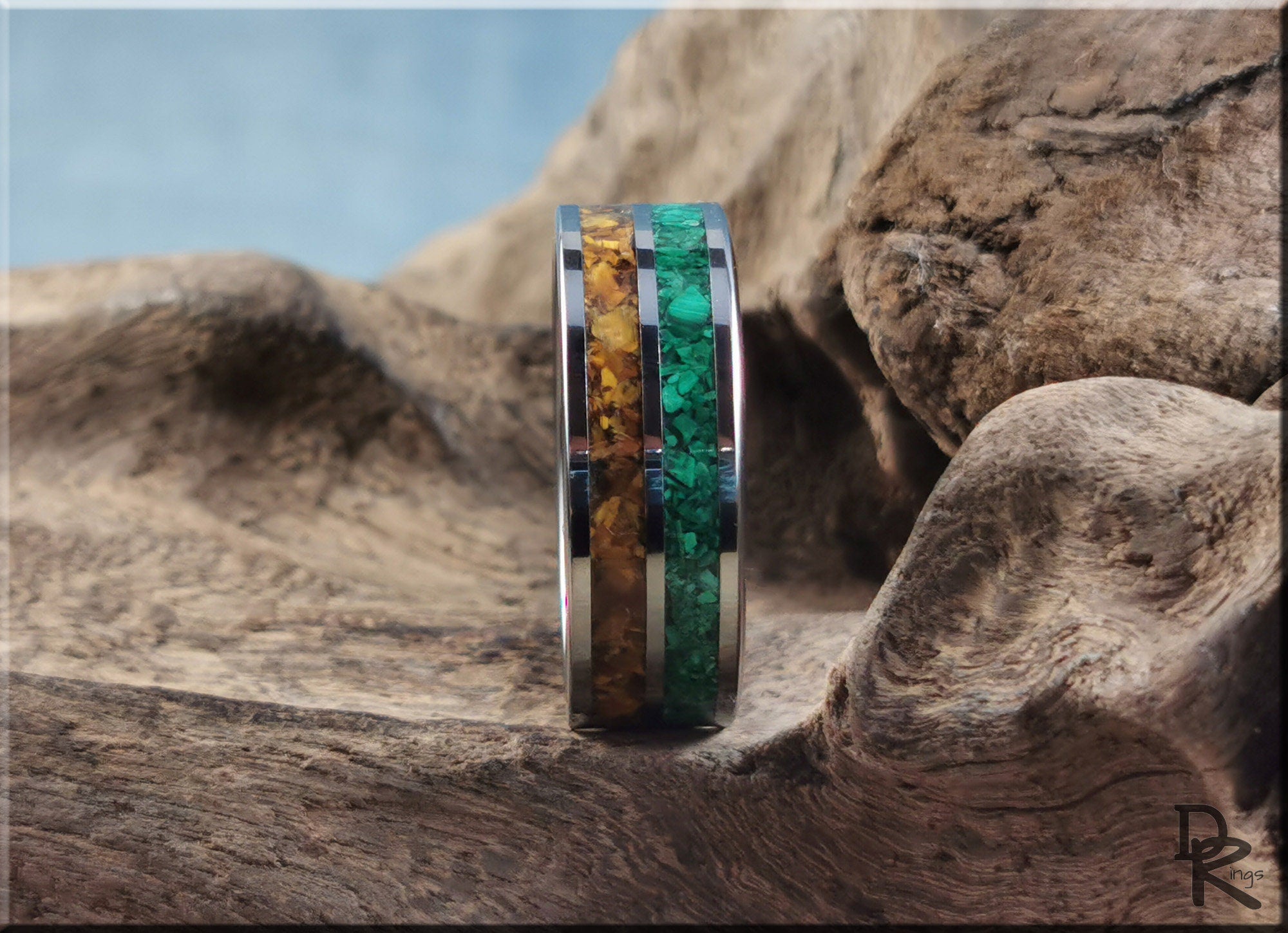DR Rings metal band ring with inlays of green and brown eye tigers stone on wood background