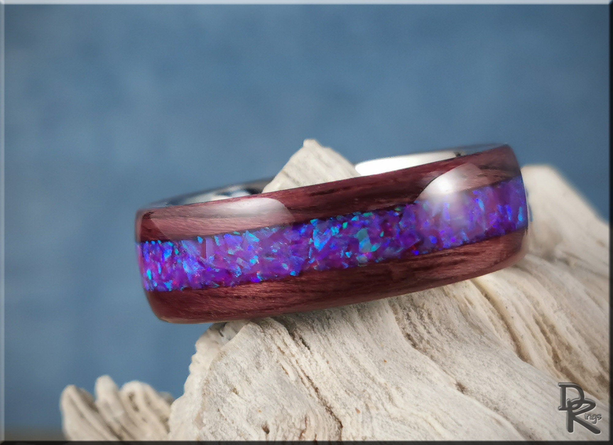 DR Rings purpleheart wood ring with opal featuring vibrant blue and purple inlay on a natural wood band
