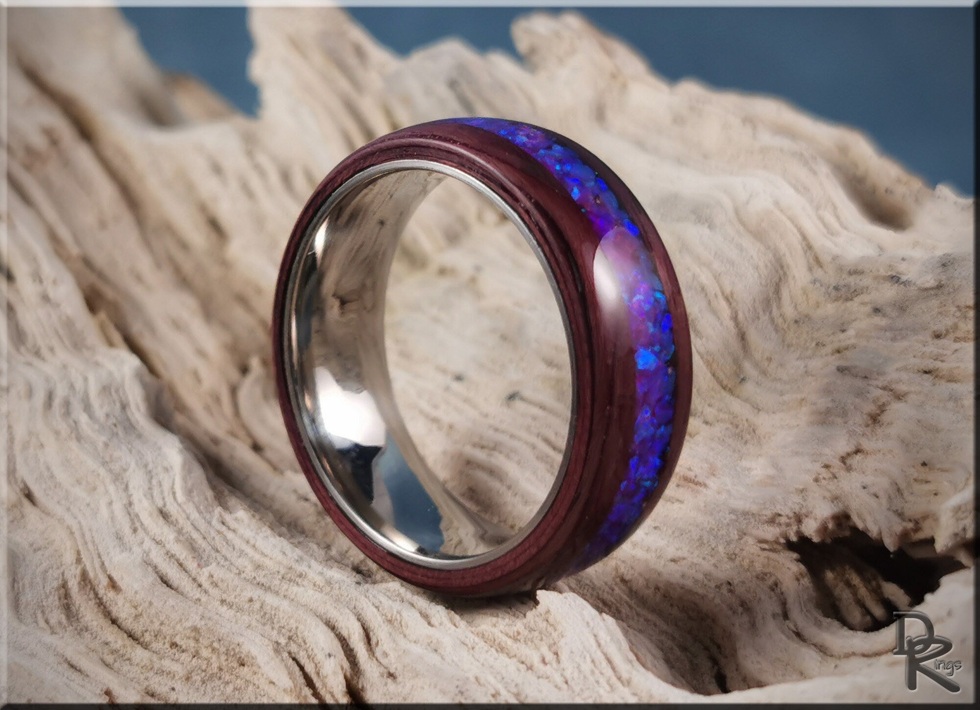 Purpleheart wood ring with opal inlay featuring vibrant blue and purple tones by DR Rings