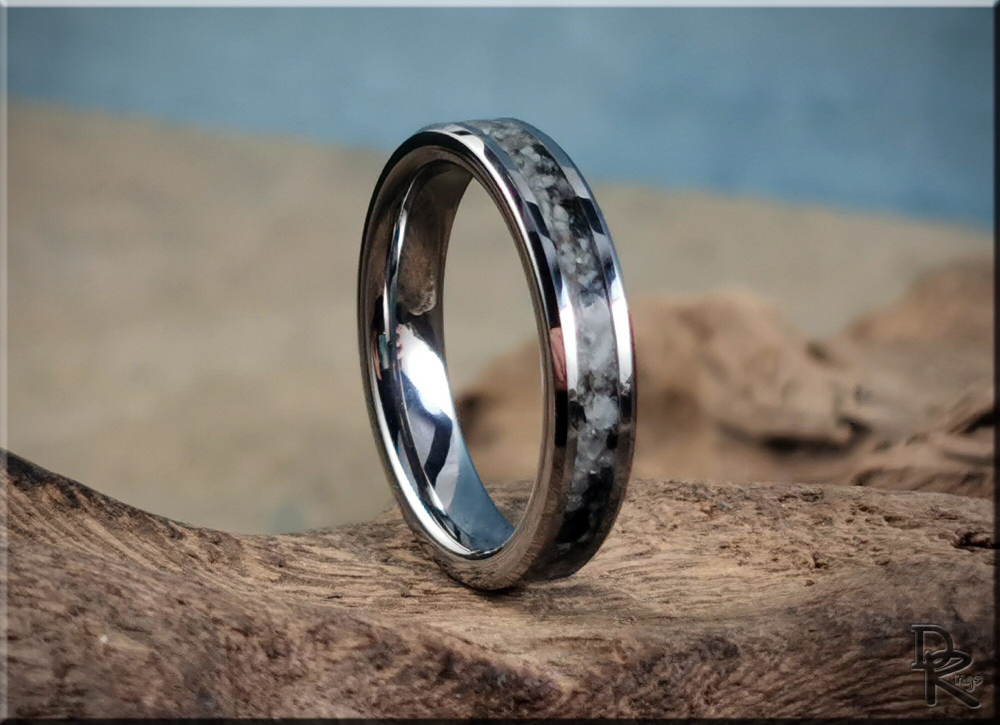 DR Rings tungsten ring with moonstone featuring a polished silver band with unique moonstone inlay
