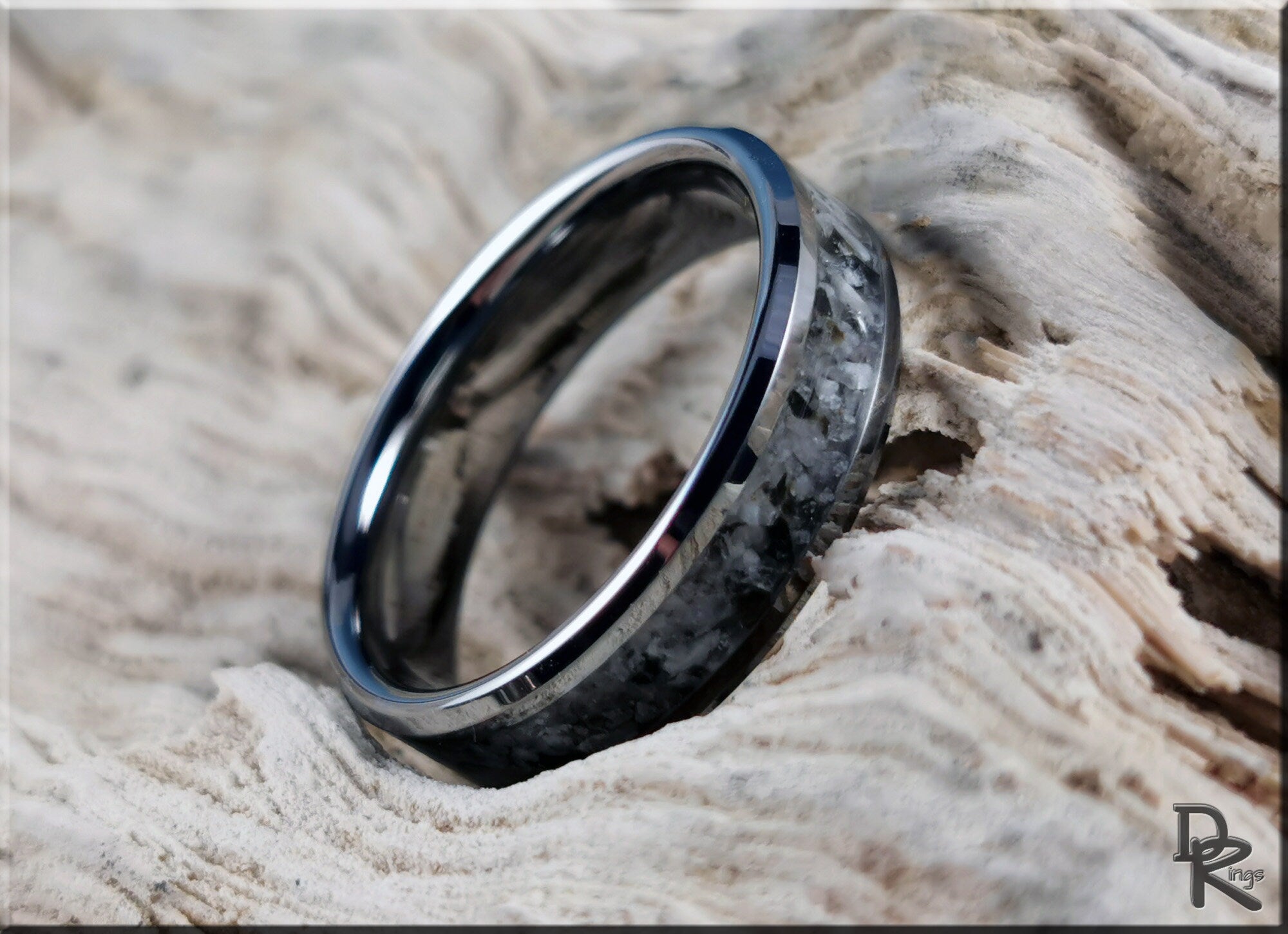 DR Rings tungsten ring with moonstone featuring a polished black band and textured moonstone inlay