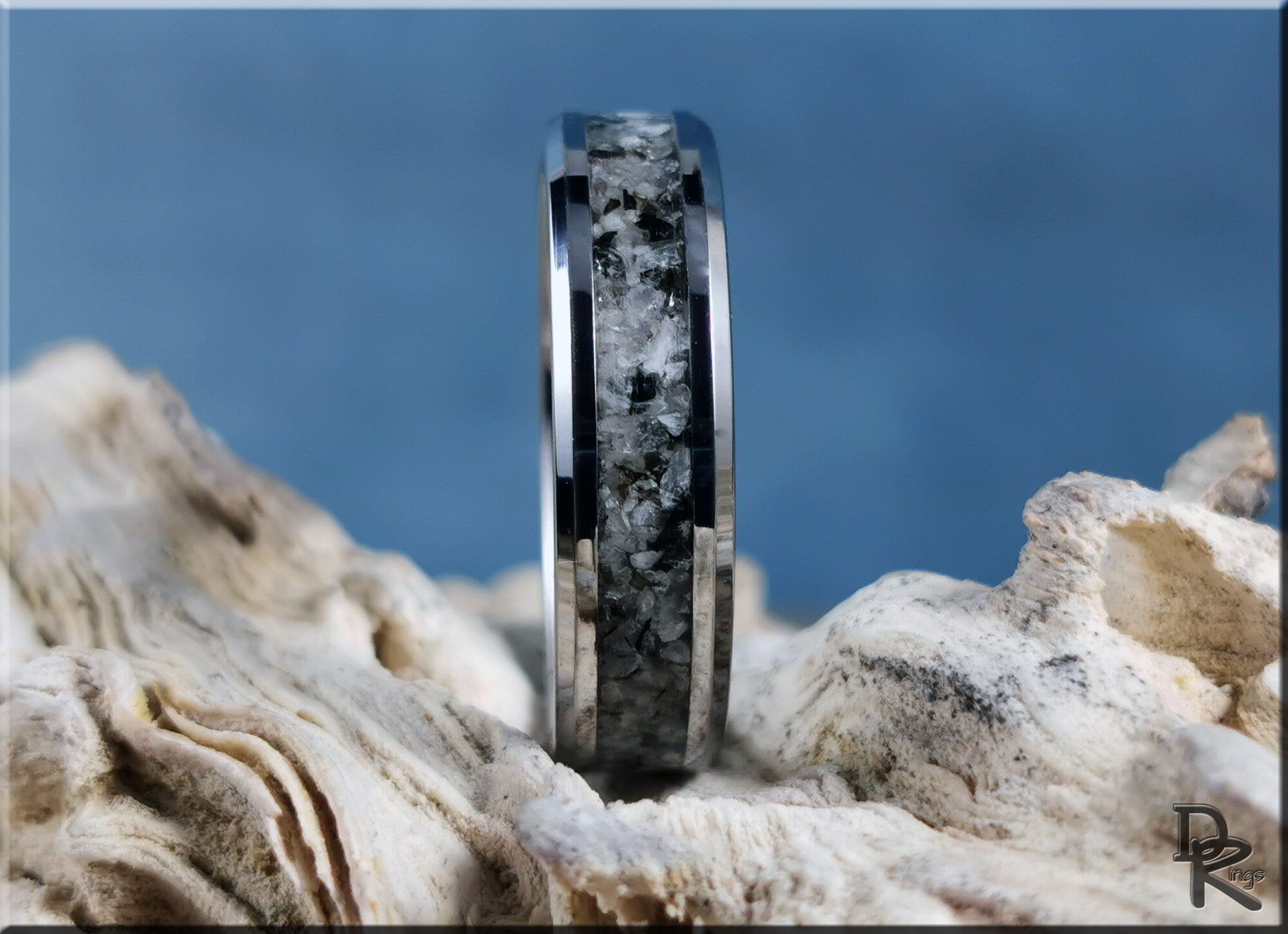 DR Rings tungsten ring with moonstone featuring a polished silver edge and textured stone inlay