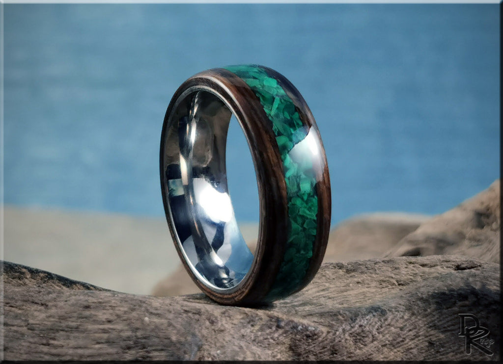 DR Rings band featuring ancient bog oak with malachite inlay and polished metal interior