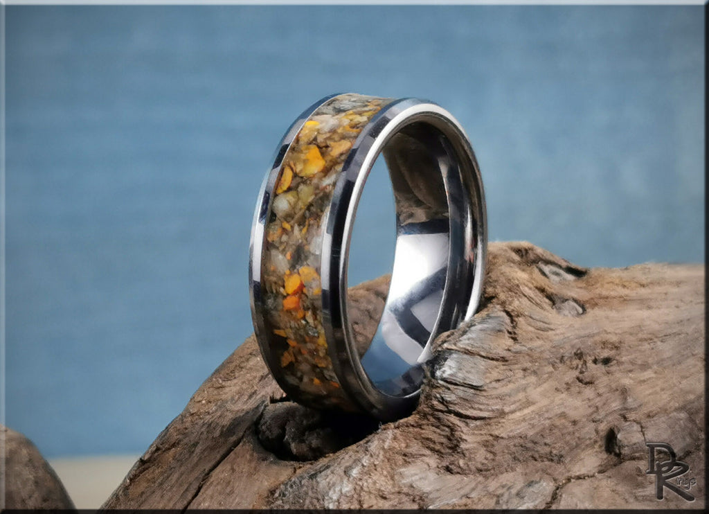 DR Rings tungsten ring with jasper inlay featuring a polished silver finish on rustic wood background