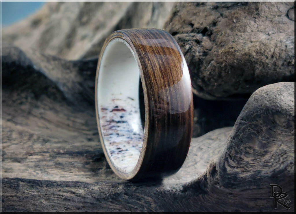 DR Rings polished wood ring featuring natural bog oak grain with smooth finish on textured surface