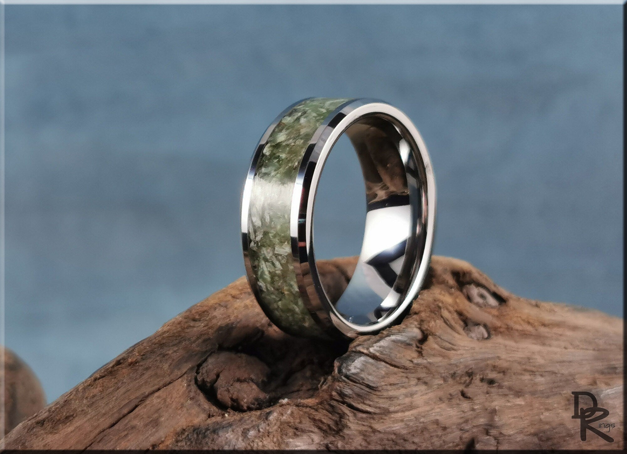 DR Rings tungsten ring with jade inlay displayed on natural wood background