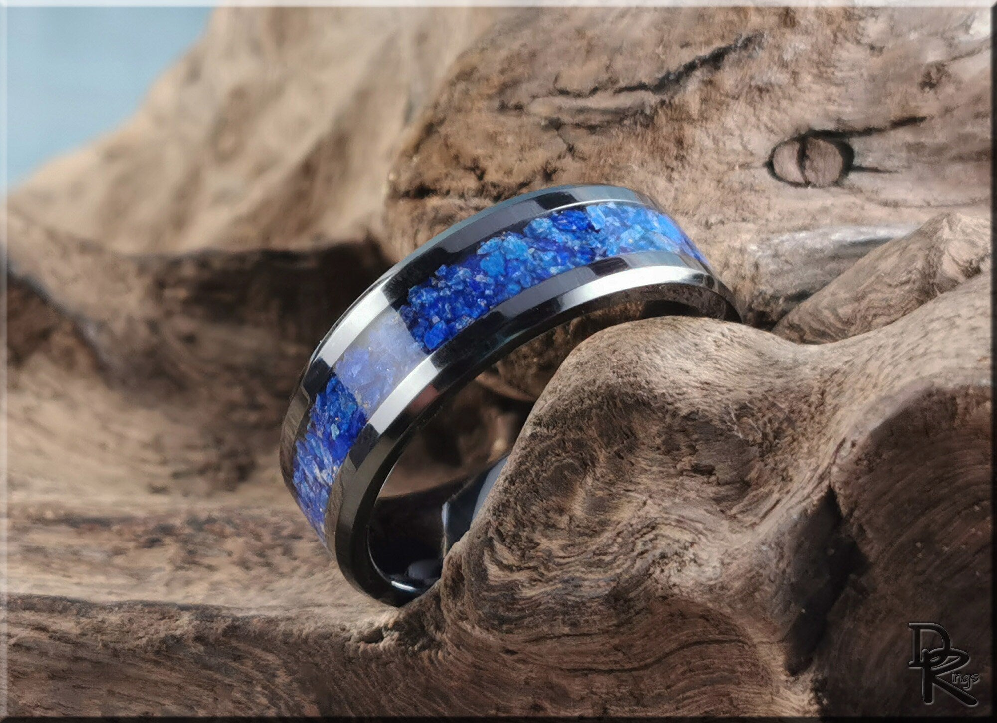 DR Rings ceramic ring with lapis featuring bright blue stone inlay on a polished dark band