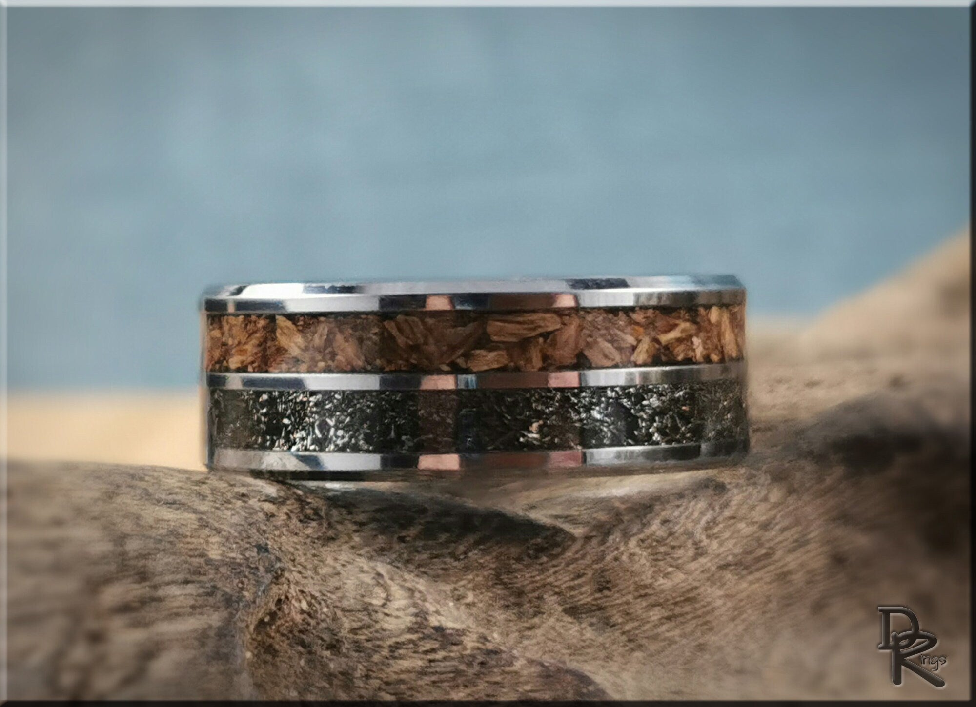 DR Rings tungsten ring with inlays featuring a wood grain and black textured design