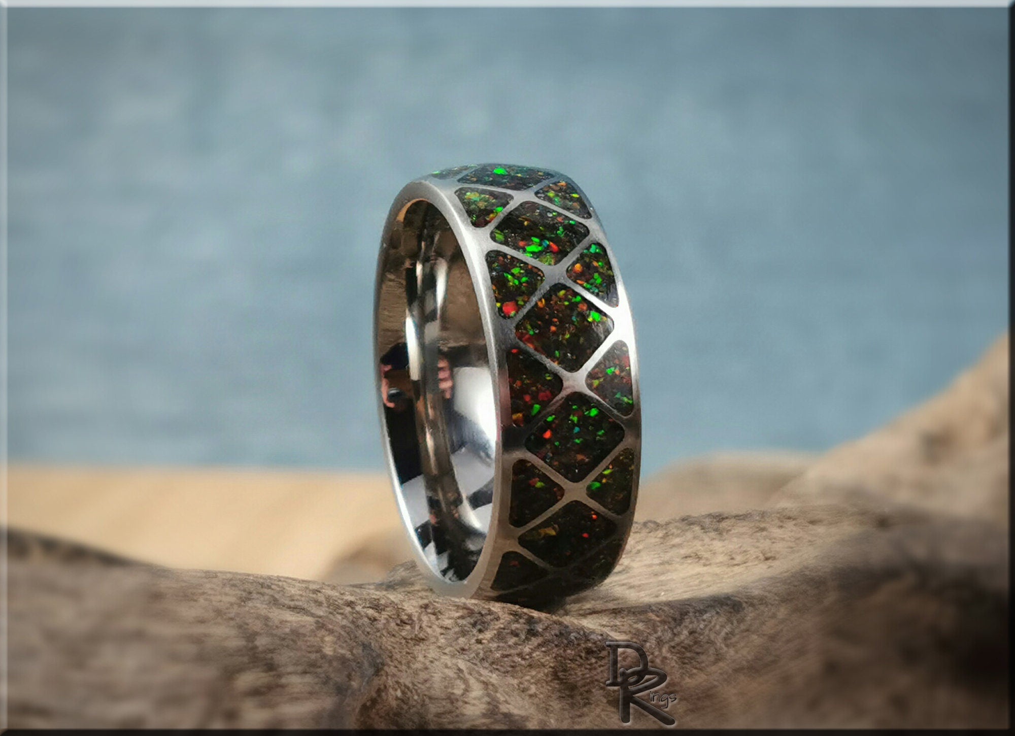 DR Rings titanium ring with opal inlay featuring multicolor opal segments set in a polished band
