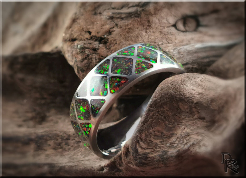 DR Rings titanium ring with opal inlay featuring vibrant green and red opal patterns on silver band