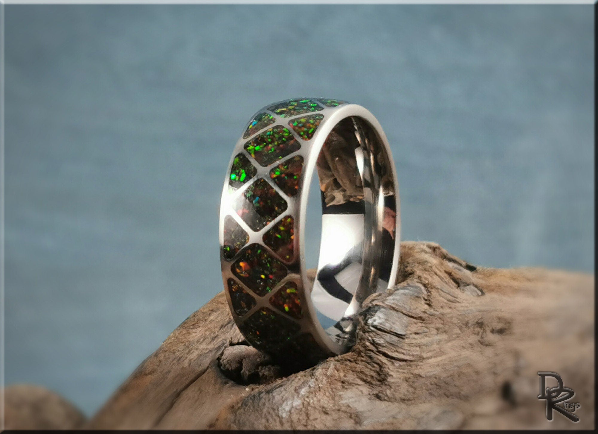 DR Rings titanium ring with opal inlay featuring green and brown opal segments in a polished silver band