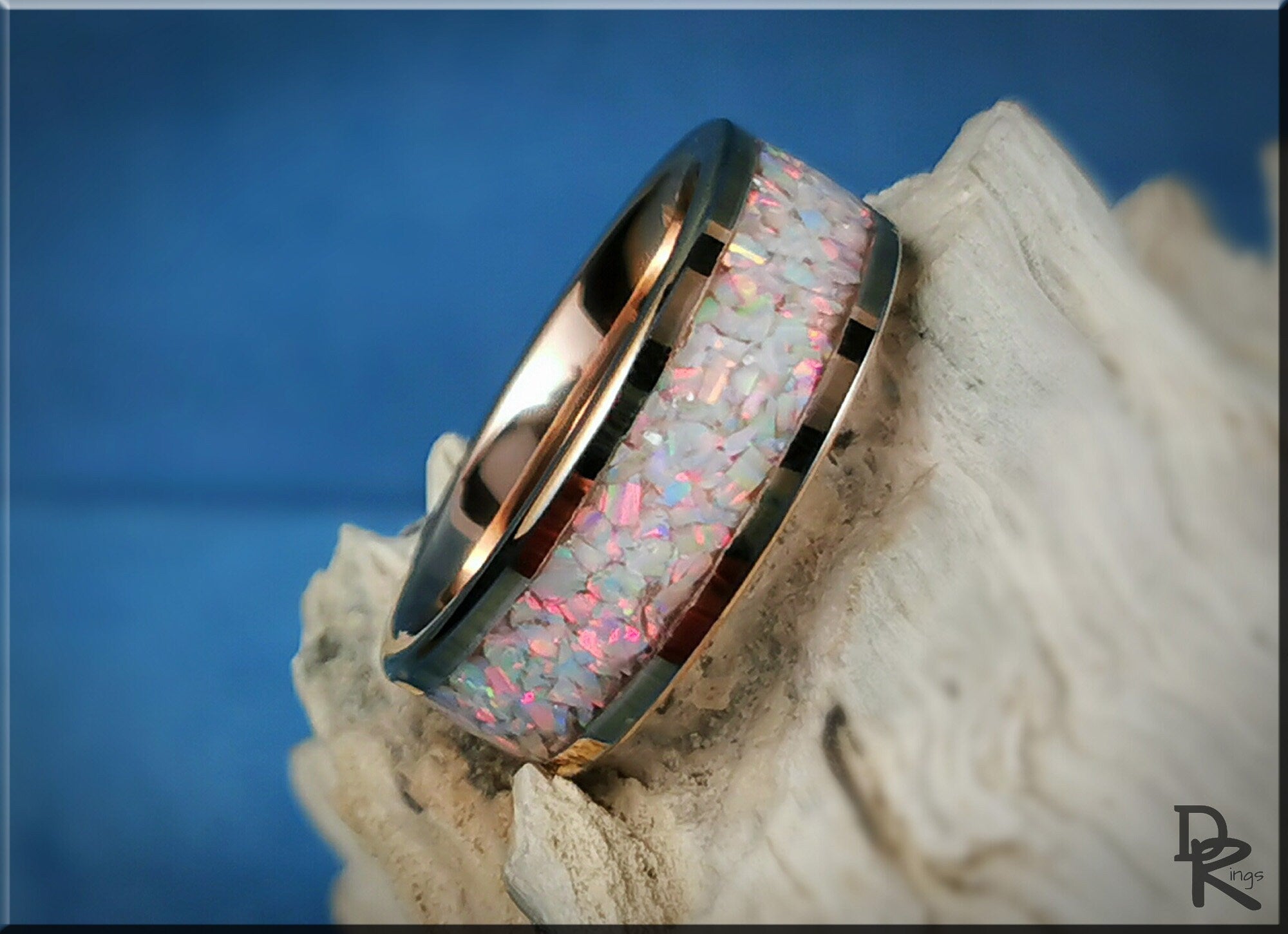 Rose gold ring with opal inlay featuring iridescent pink and white tones by DR Rings