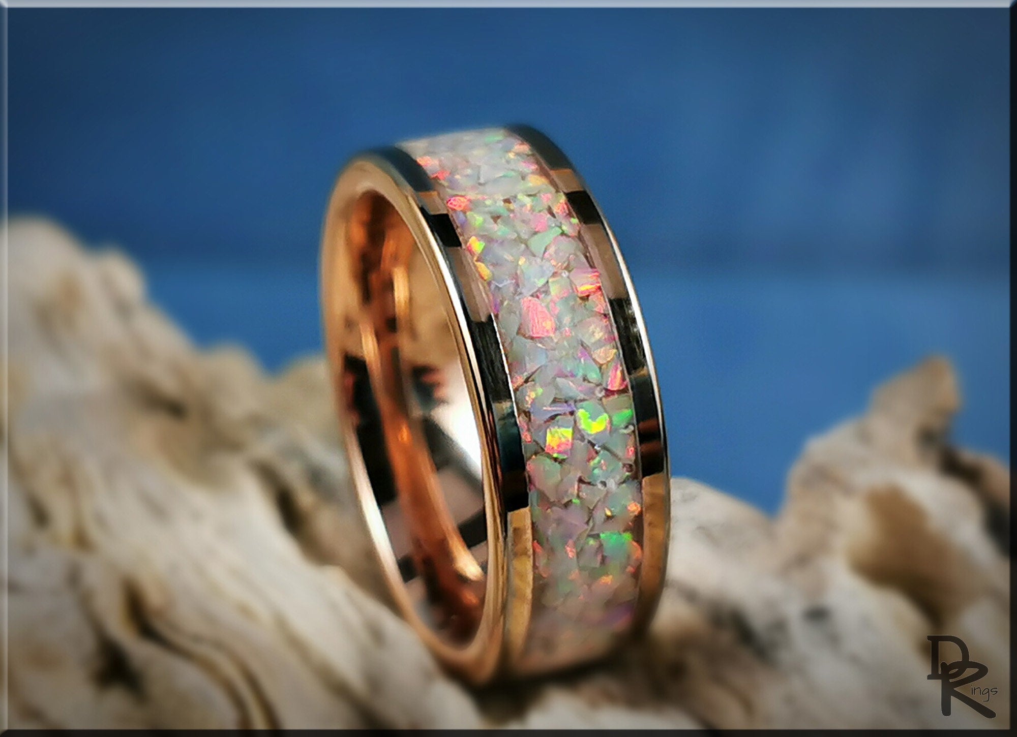 Rose gold ring with opal inlay showing colorful iridescent opal chips by DR Rings