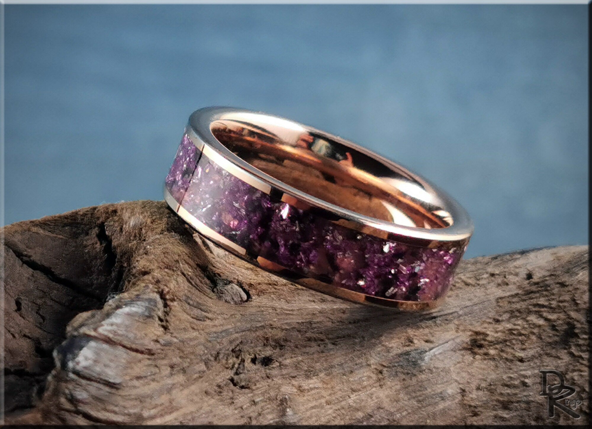 Rose tungsten ring with german glass purple crushed design on wooden surface by DR Rings