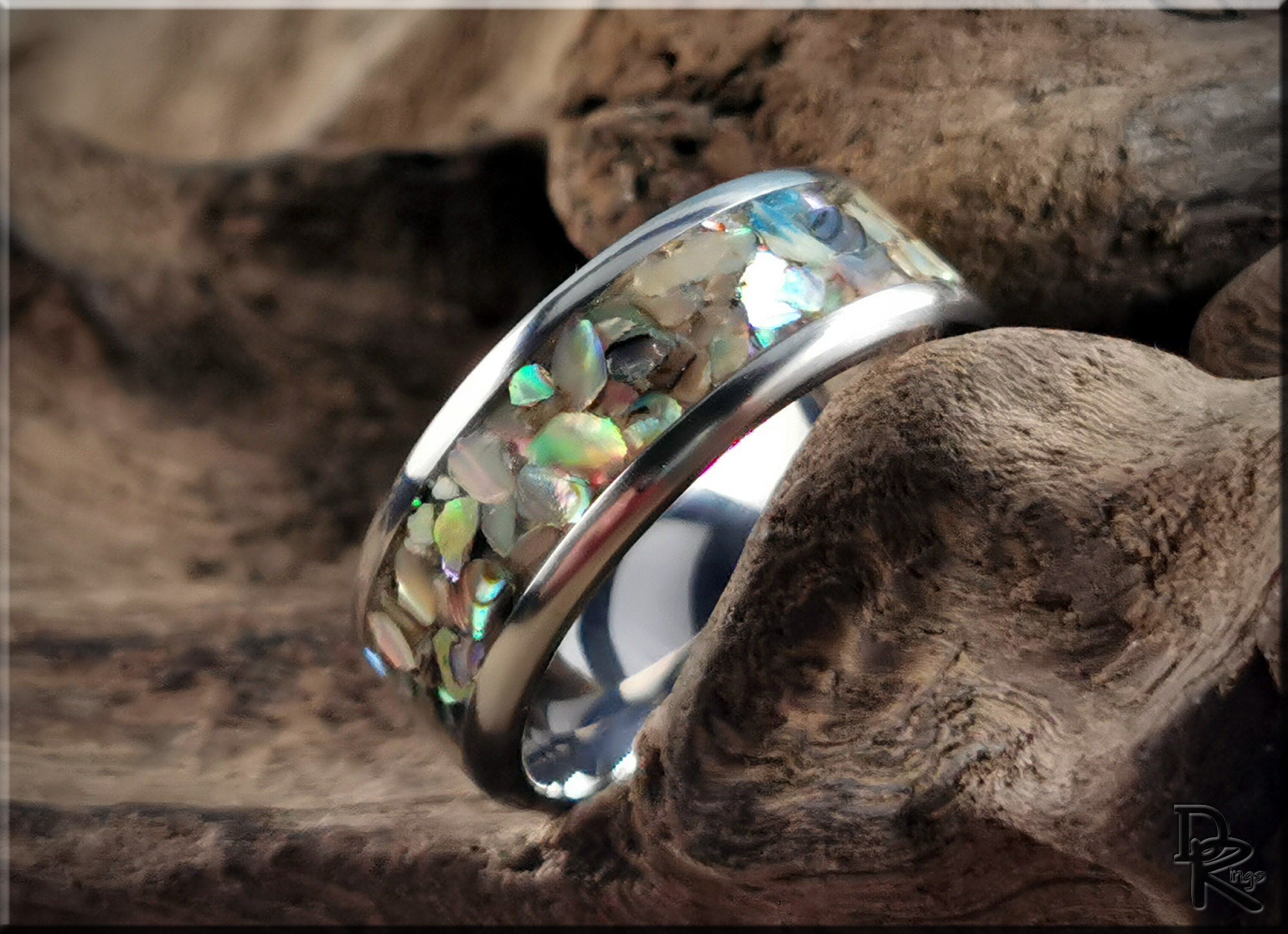 DR Rings titanium ring with abalone inlay featuring iridescent multicolor shell design