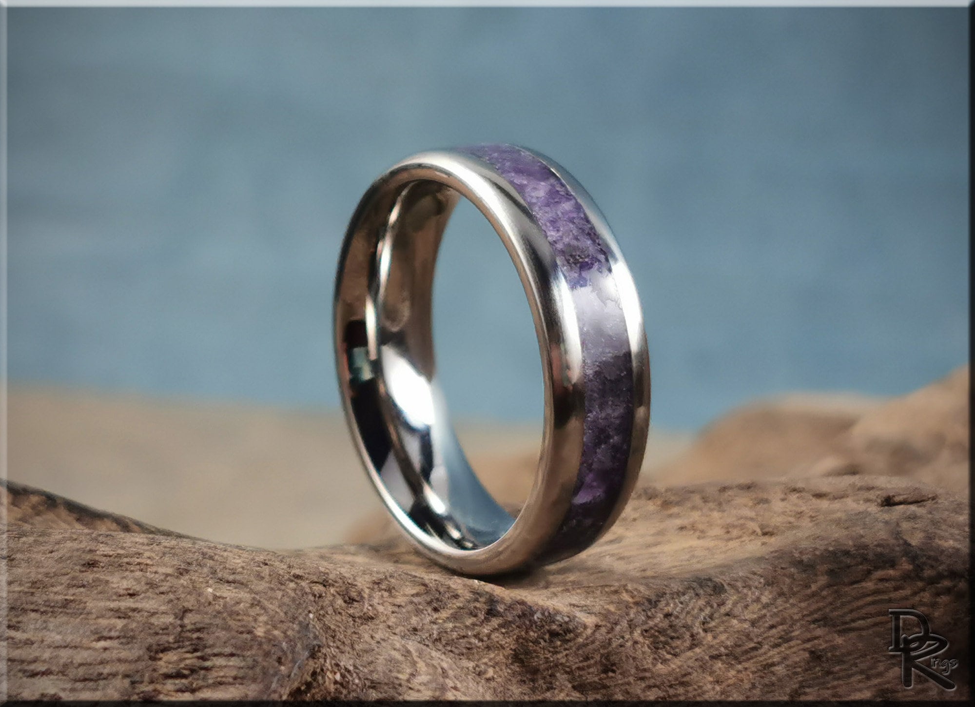 DR Rings titanium ring with amethyst inlay on textured wood background