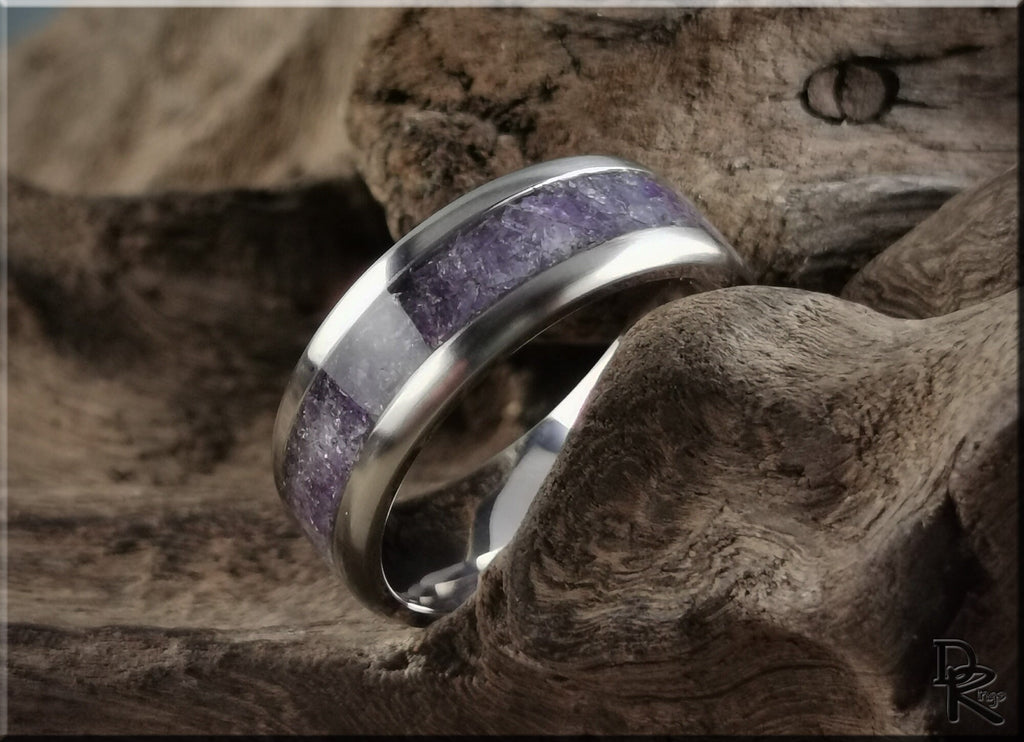DR Rings titanium ring with amethyst inlay displayed on textured wood background