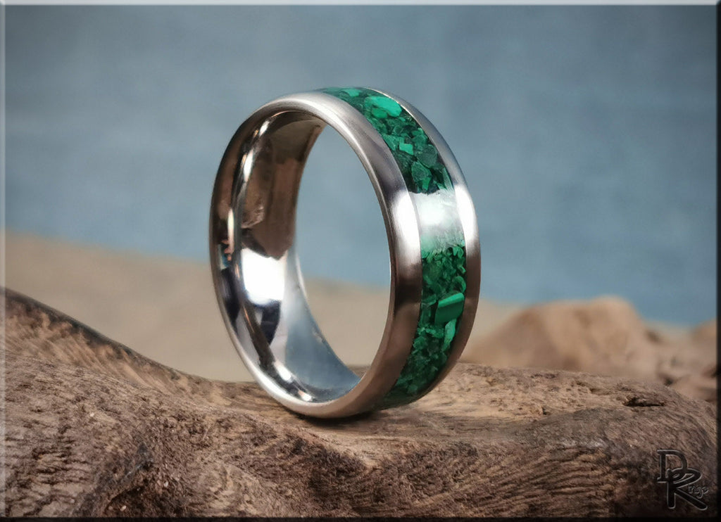 DR Rings titanium ring with malachite inlay featuring a polished silver band and vibrant green stone