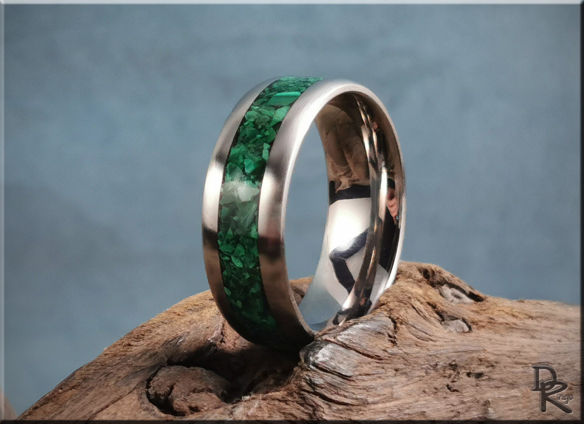 DR Rings titanium ring with malachite inlay featuring a polished silver band and vibrant green stone inlay