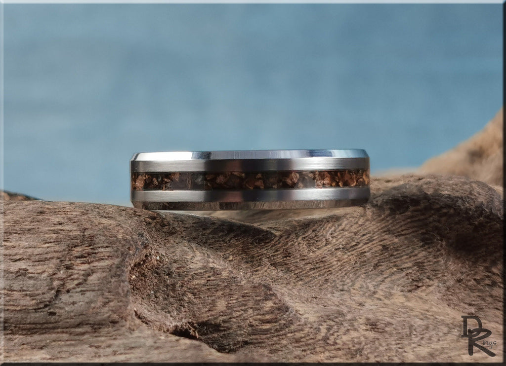 Tungsten carbide ring with inlay featuring a brown textured center band on a polished silver base