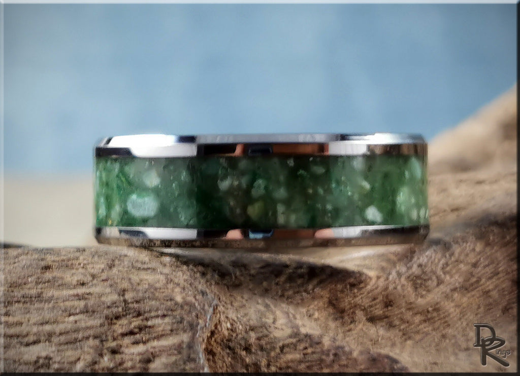 DR Rings tungsten carbide ring with inlay featuring a green stone embedded band design
