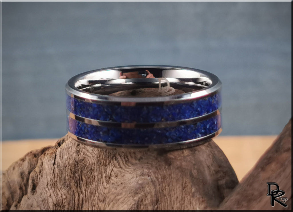 DR Rings tungsten ring with lapis lazuli blue stone inlay on rustic wood background
