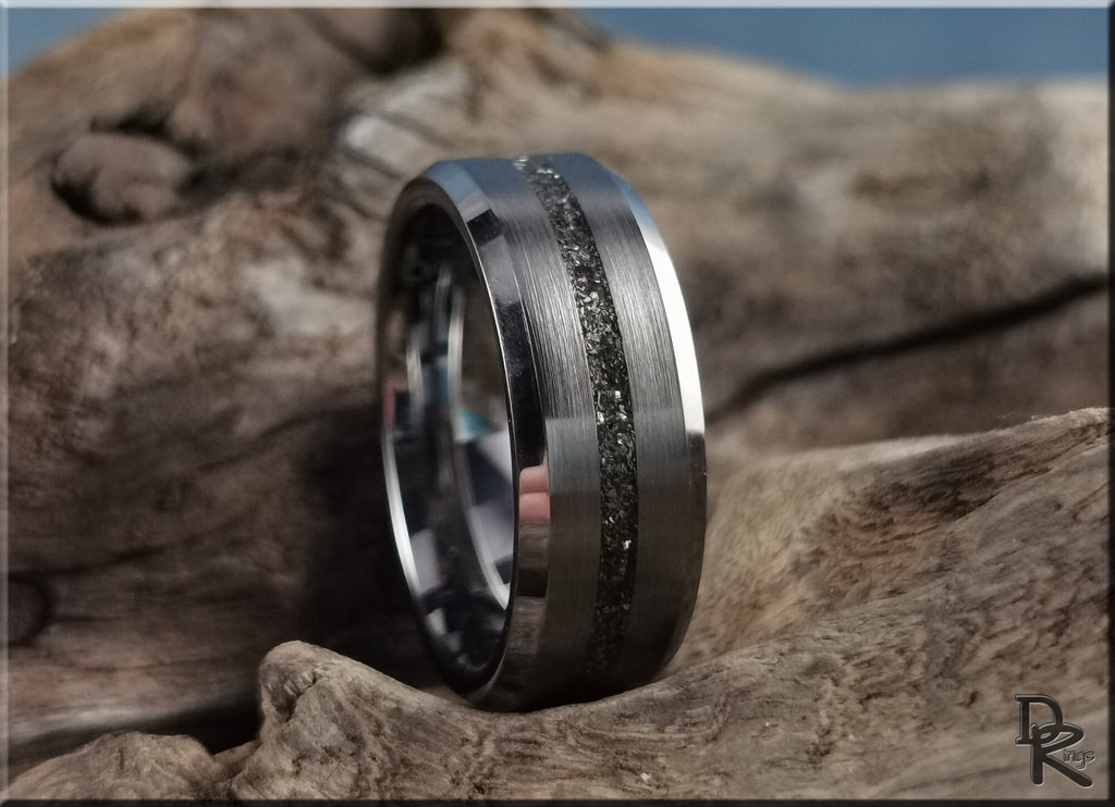 DR Rings tungsten ring with meteorite inlaid band on textured natural wood background